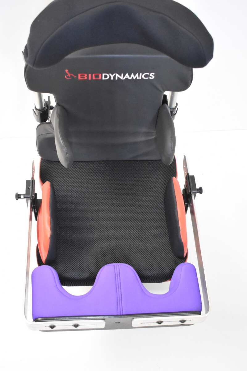 Bioform Anterior Knee Block, Lateral Mount with Brackets mounted to seat pan
